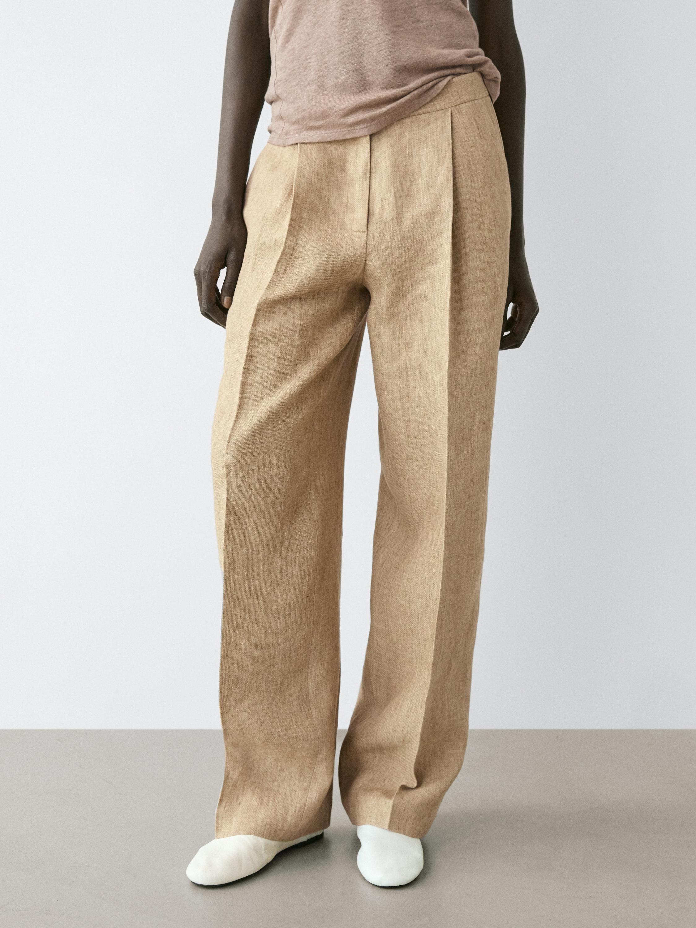 Flowing linen trousers with darts